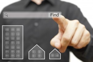male is using on line search to find proper real estate